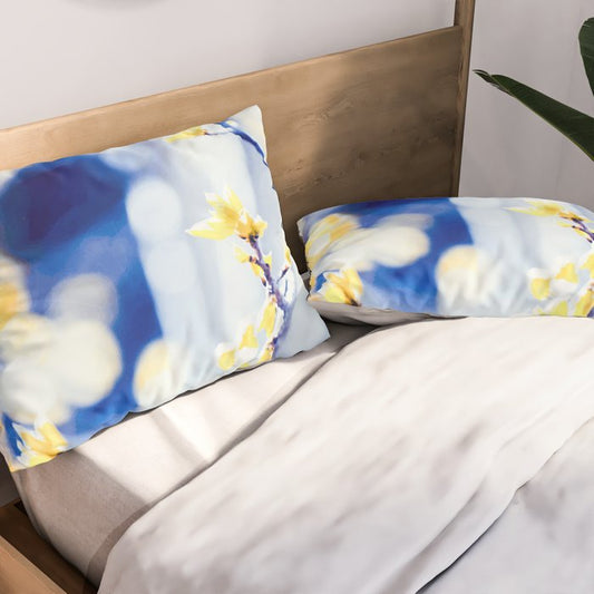 Branches and bokeh in blue and gold pillow sham