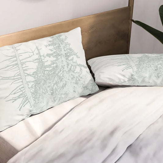 Icy forest in pale green pillow sham